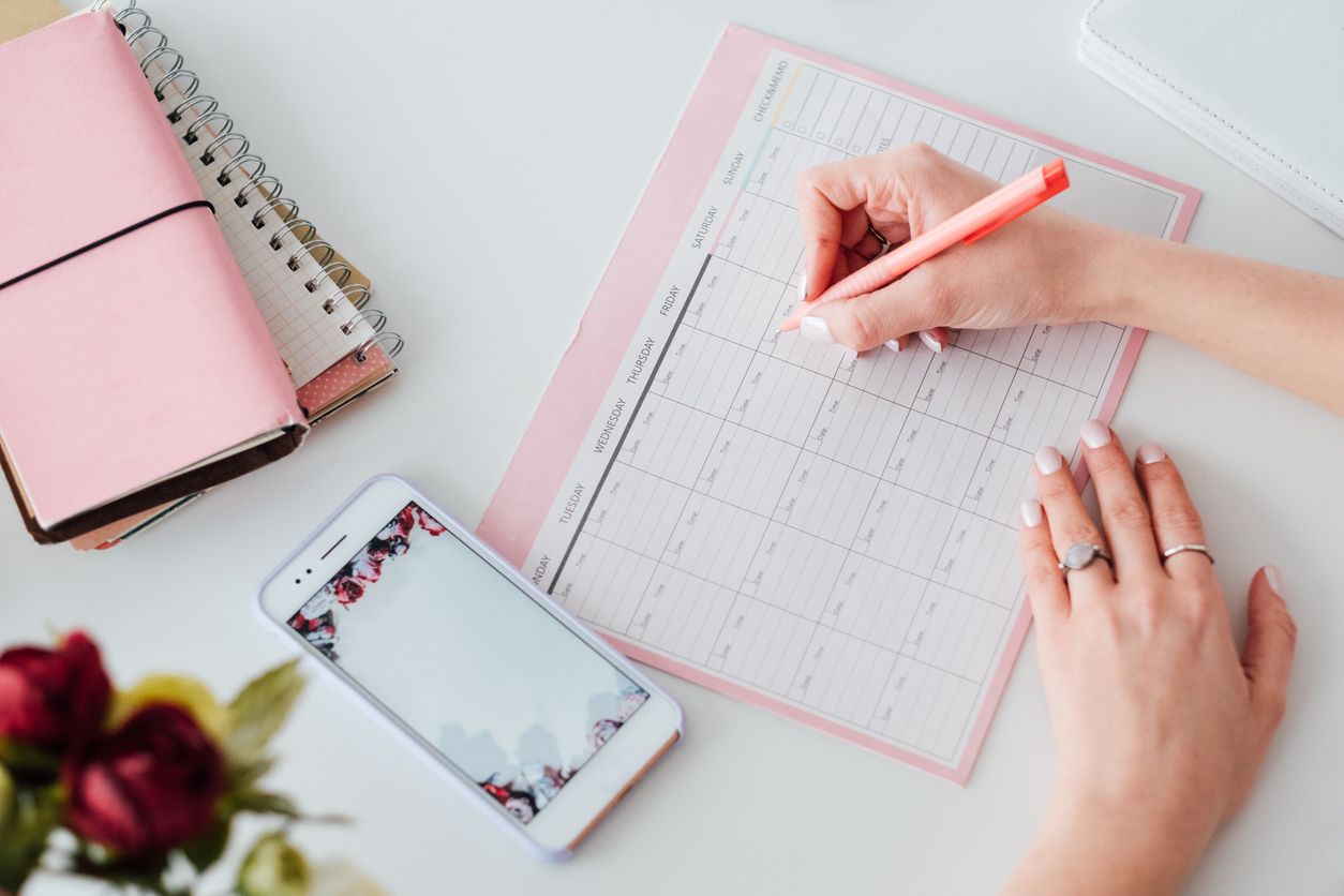 Planning ahead using a calendar to write in important dates