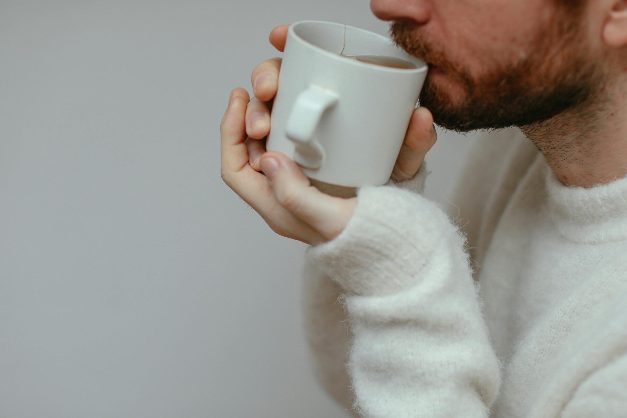 Esthetician staying hydrated with tea