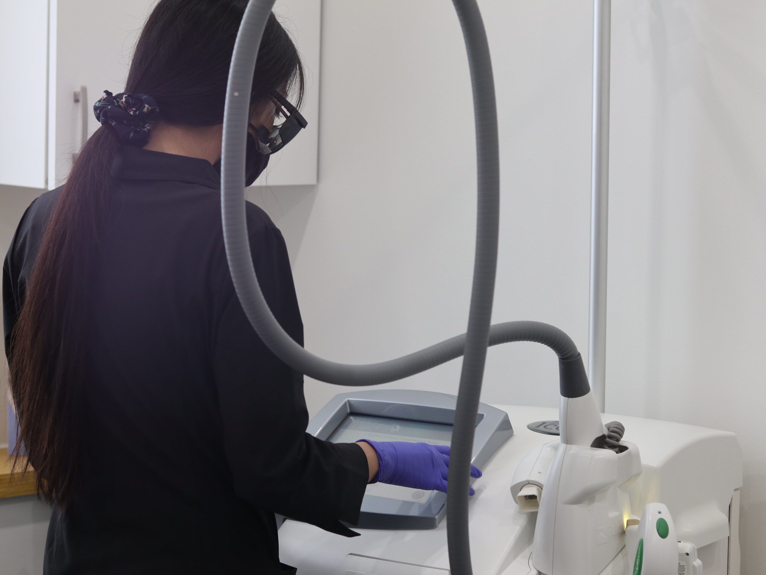 laser technician preparing the laser modality