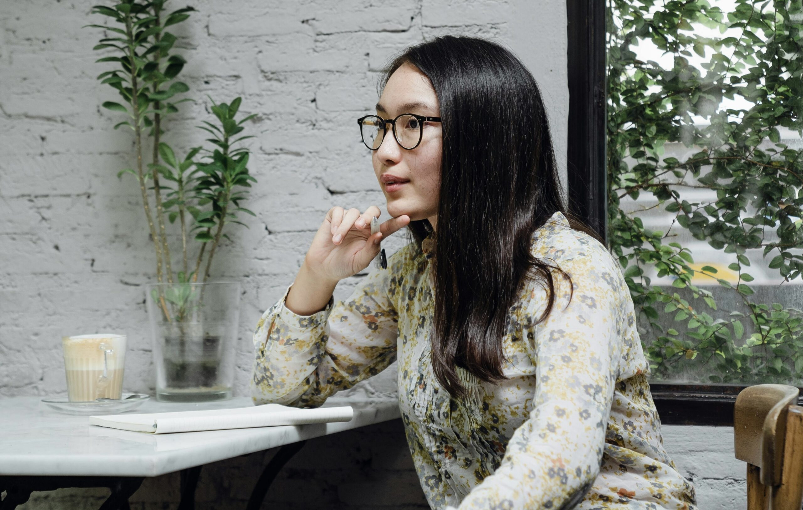 “An open planner with goals and tasks written in it, illustrating the process of making a plan.”